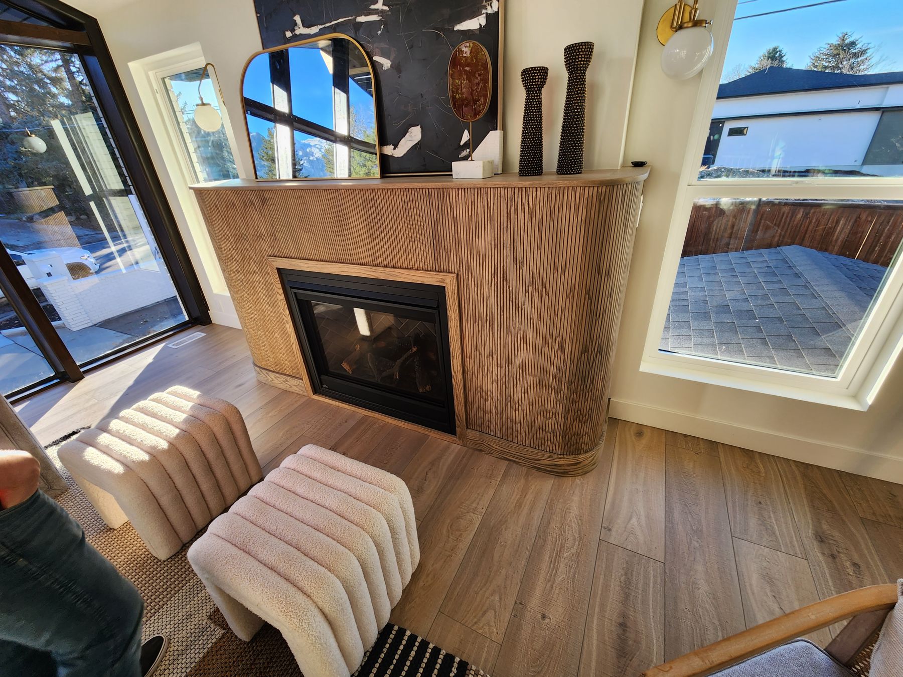 Red oak pole-wrap fireplace with curved walls