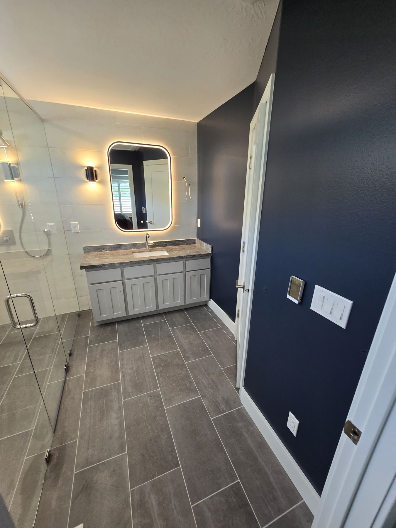 Bathroom renovation — curbless shower with floating bench