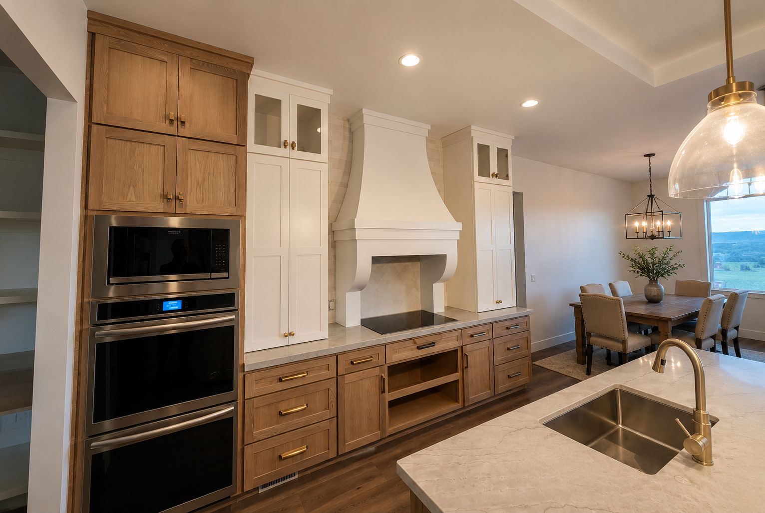 Custom hood build-out with white oak and white cabinetry
